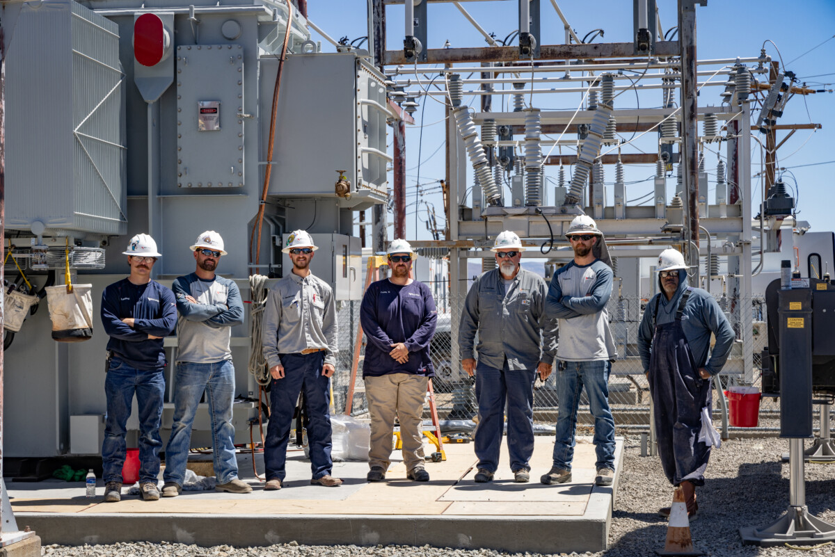Left to right; Substation Apprentice Jonathon Lanting, Substation Apprentice Marc Jones, Substation Apprentice Dakota Newbrough, Substation Journeyman Casey Segale, Substation Journeyman Tommy Harpster, Foreman Josh Toulouse and Substation Journeyman Robert Murphy.  IBEW Local 1245 members from NV Energy assemble a new transformer at the Northwest Substation in Reno, Nevada on August 14, 2024.